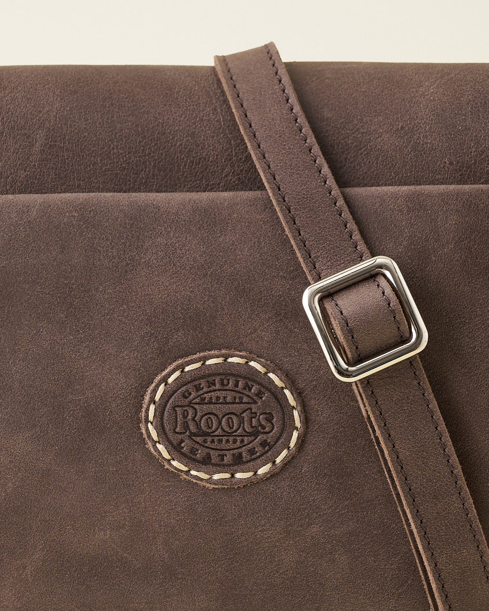 Roots crossbody sale