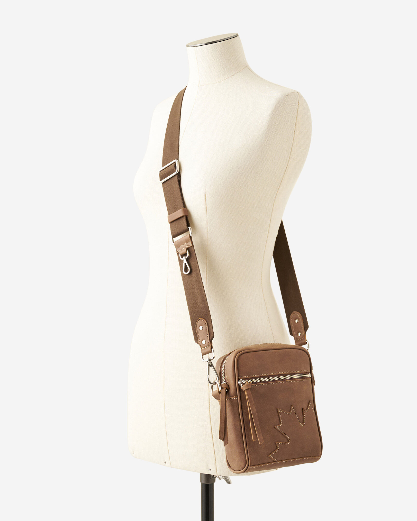 Roots crossbody bag 2025