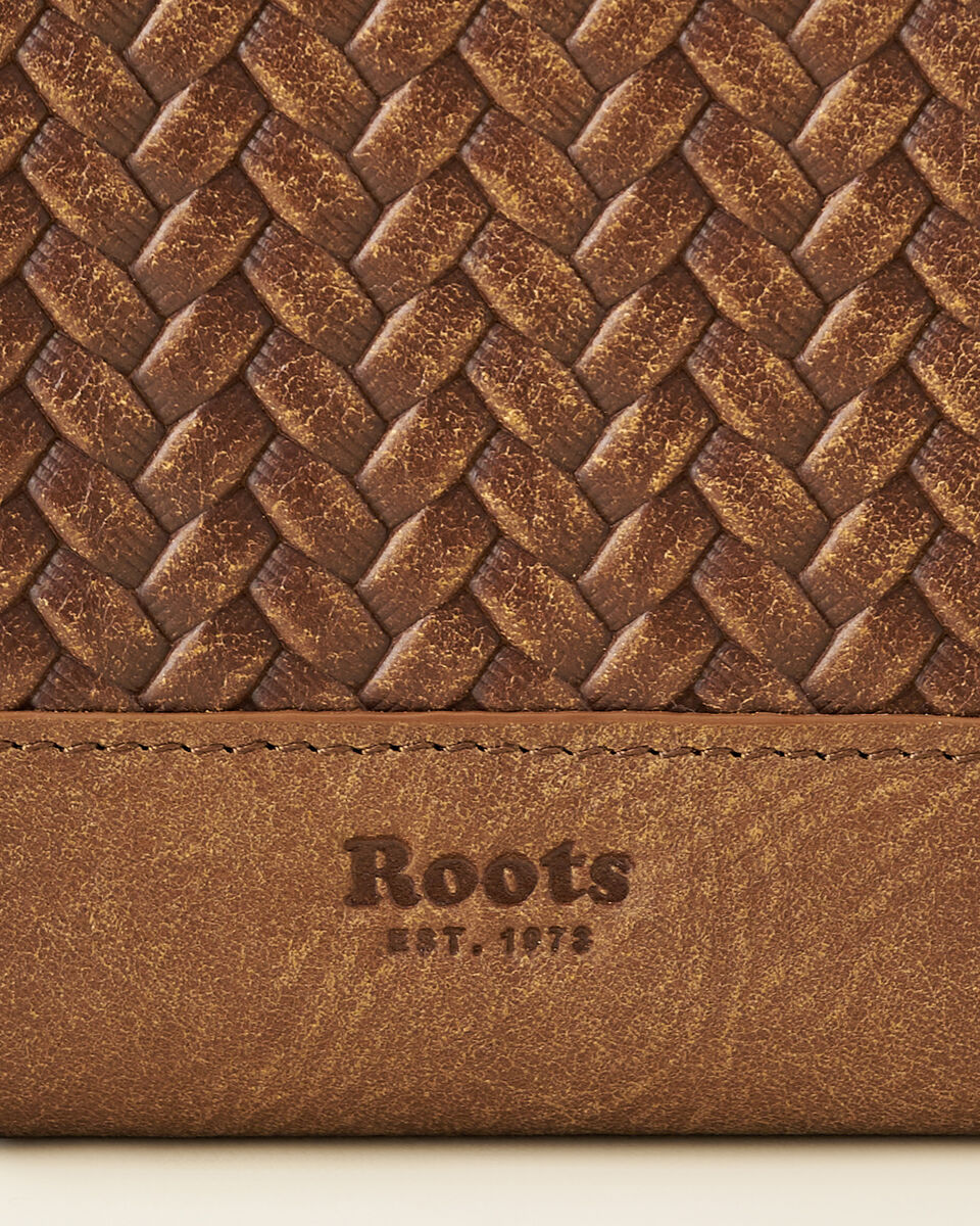 Roots Small Zip Around Clutch Woven. 5