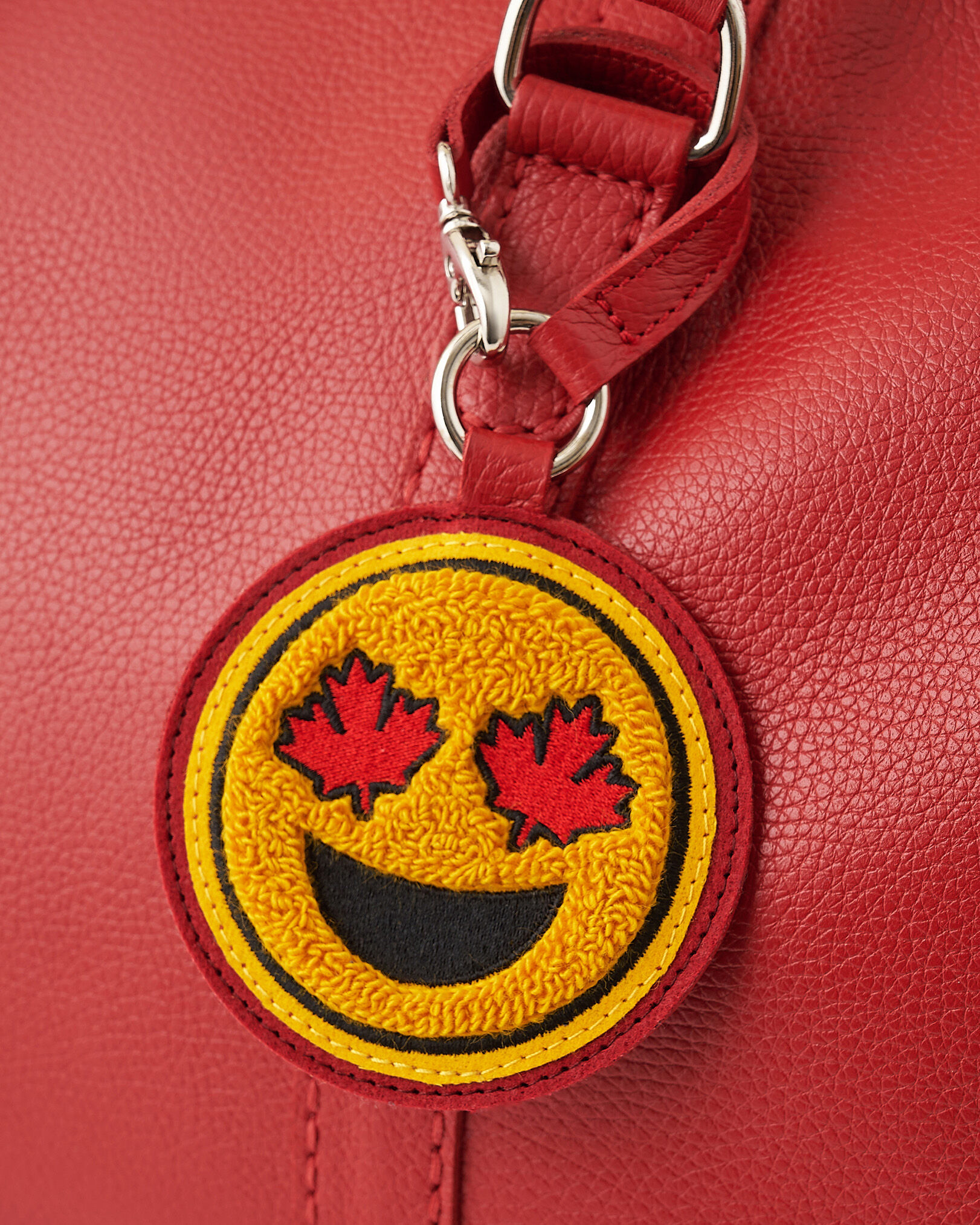 Maple Leaf Smiley Charm