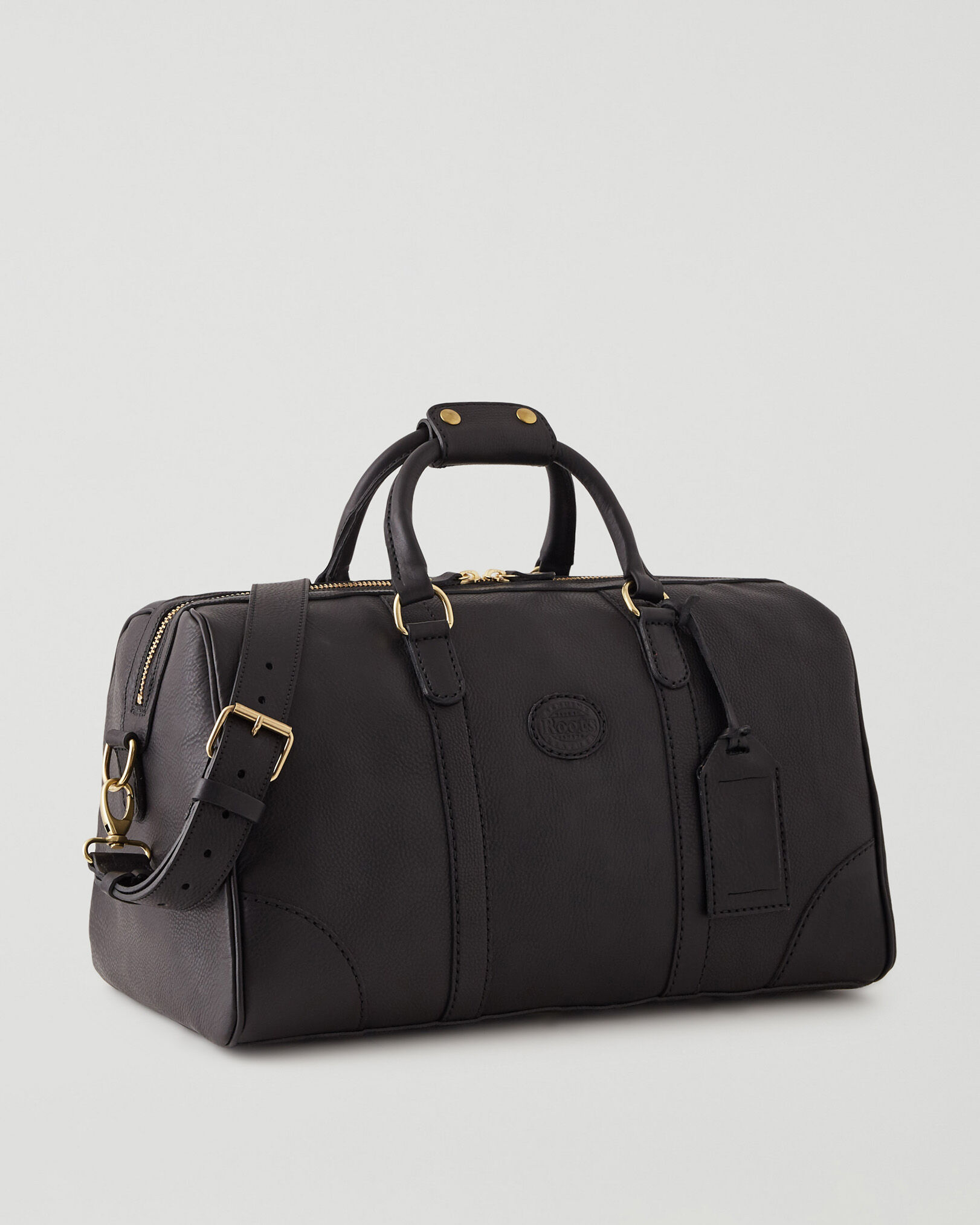 Roots leather duffle bag clearance