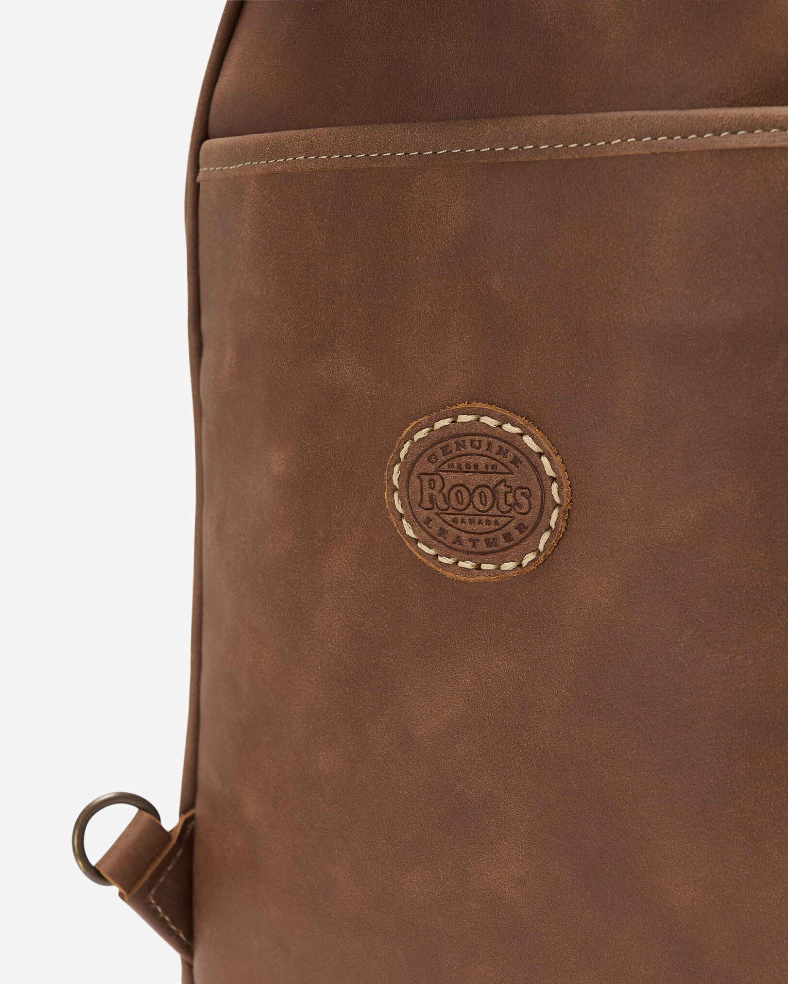 Roots sling bag sale