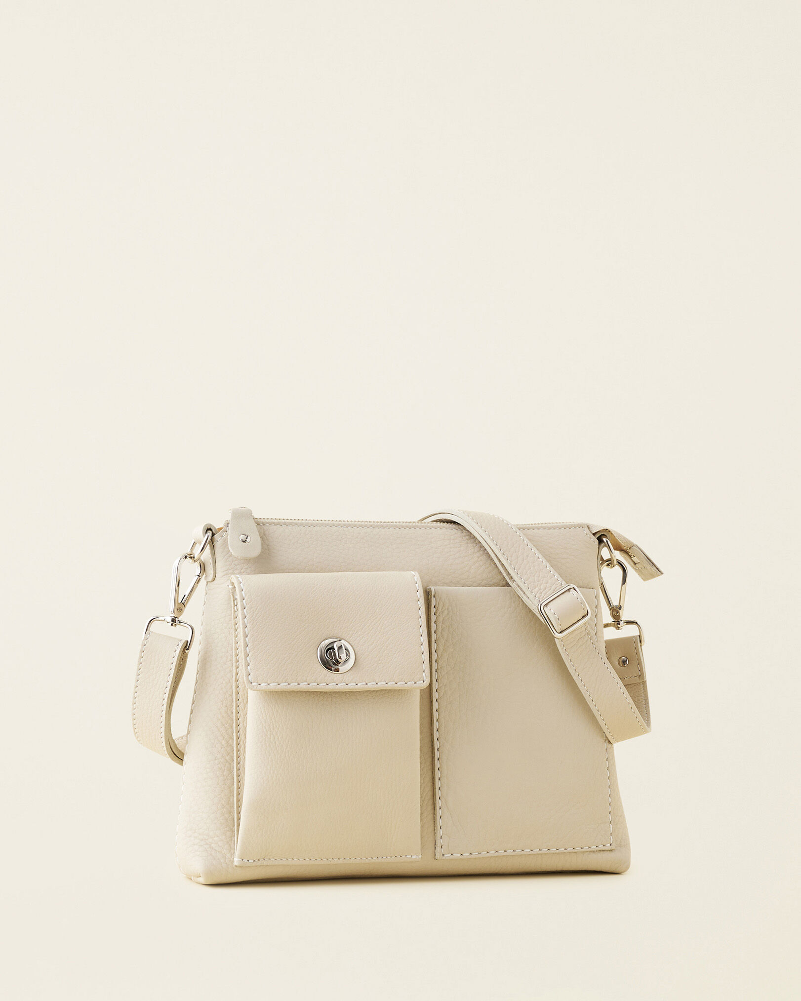 The Villager Cloud Handbags Roots