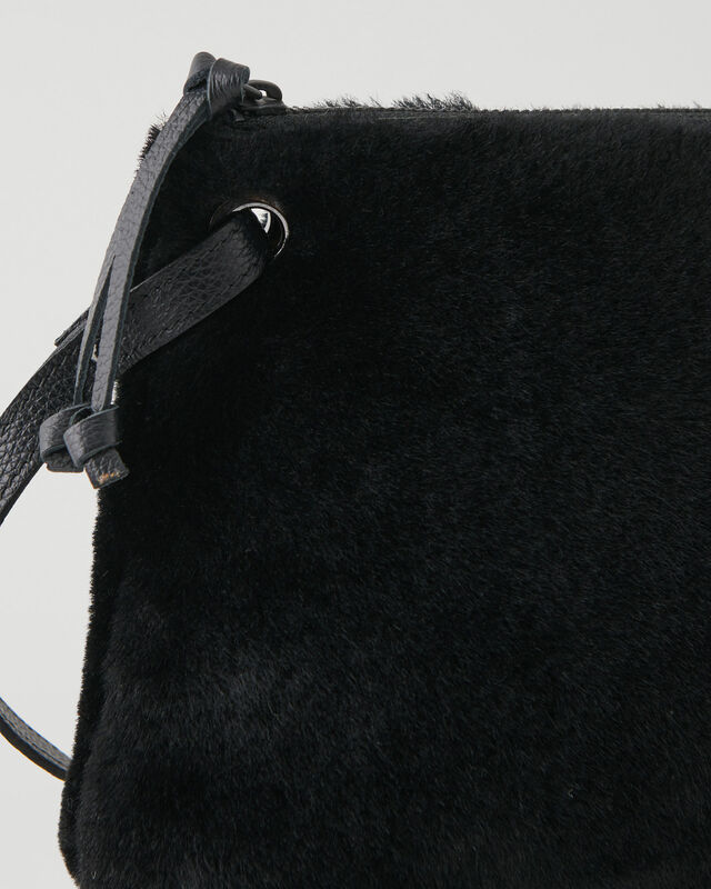 Roots Shearling Edie Bag. 5