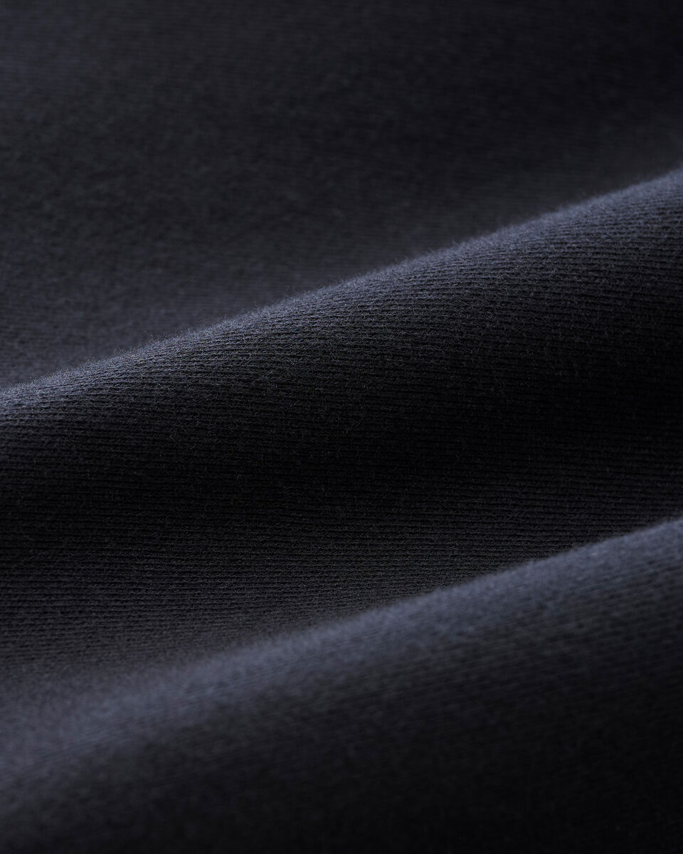 Pantalon original ajusté à cheville côtelée en molleton de coton bio