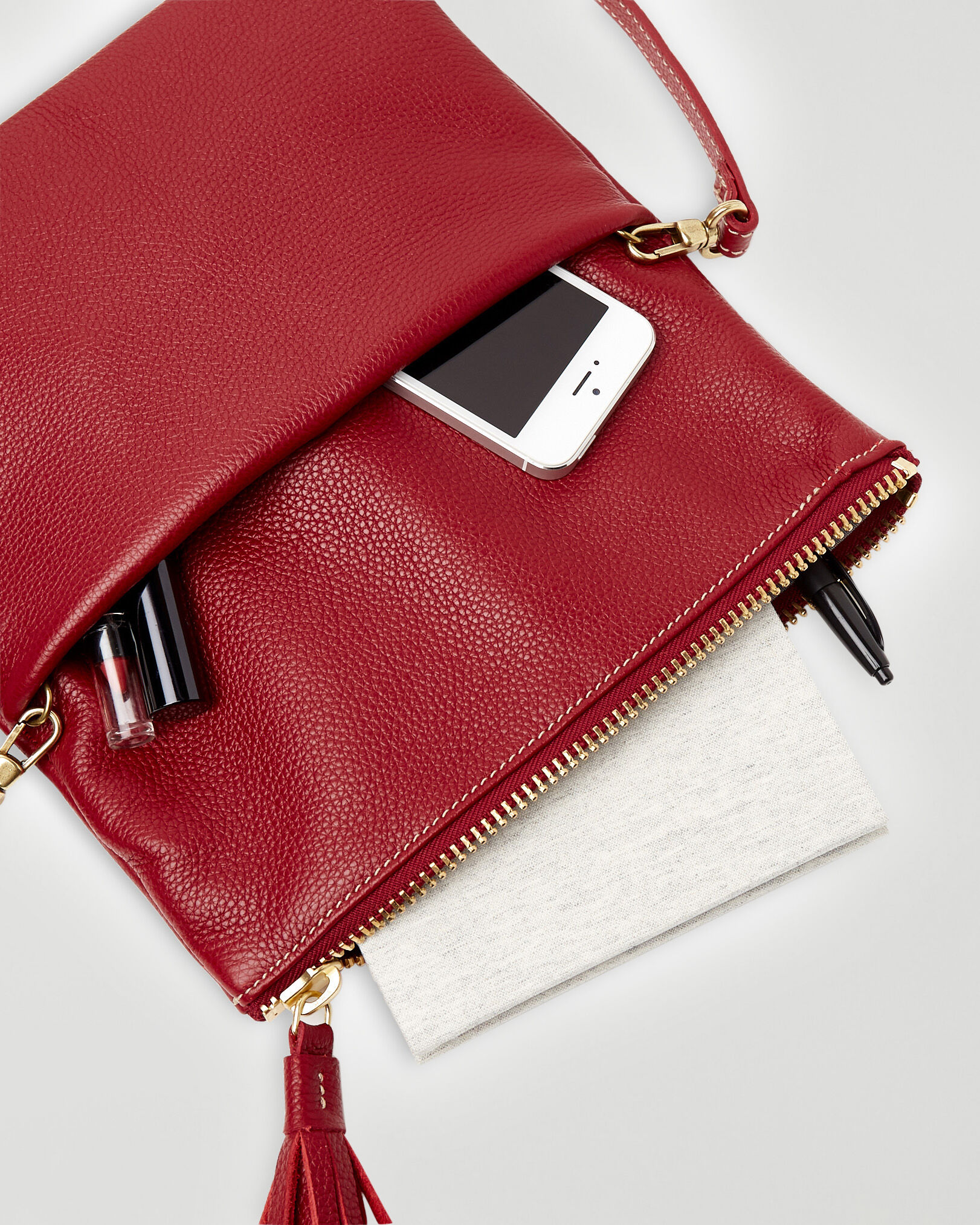 Roots clutch purse hotsell