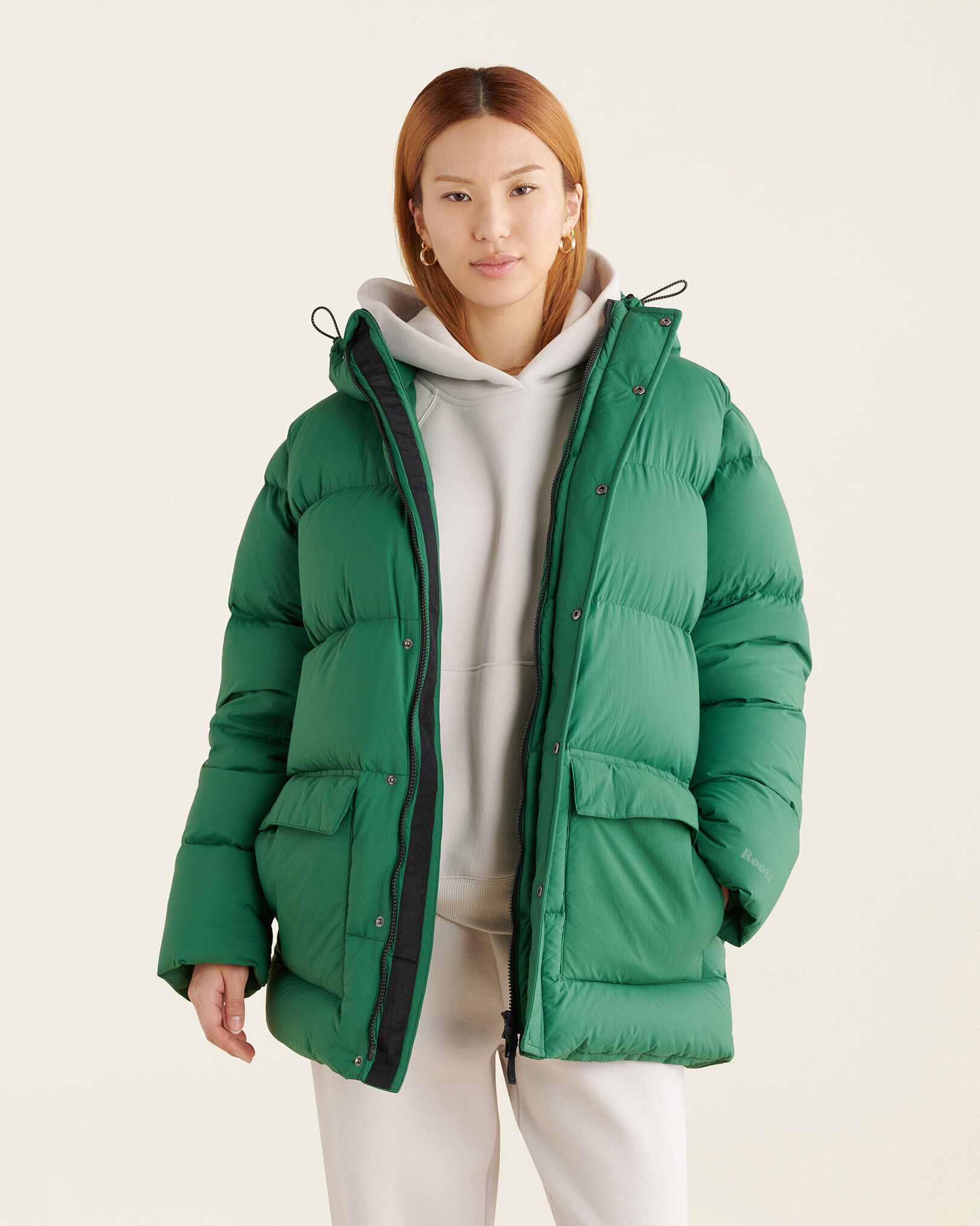Roots down coat sales