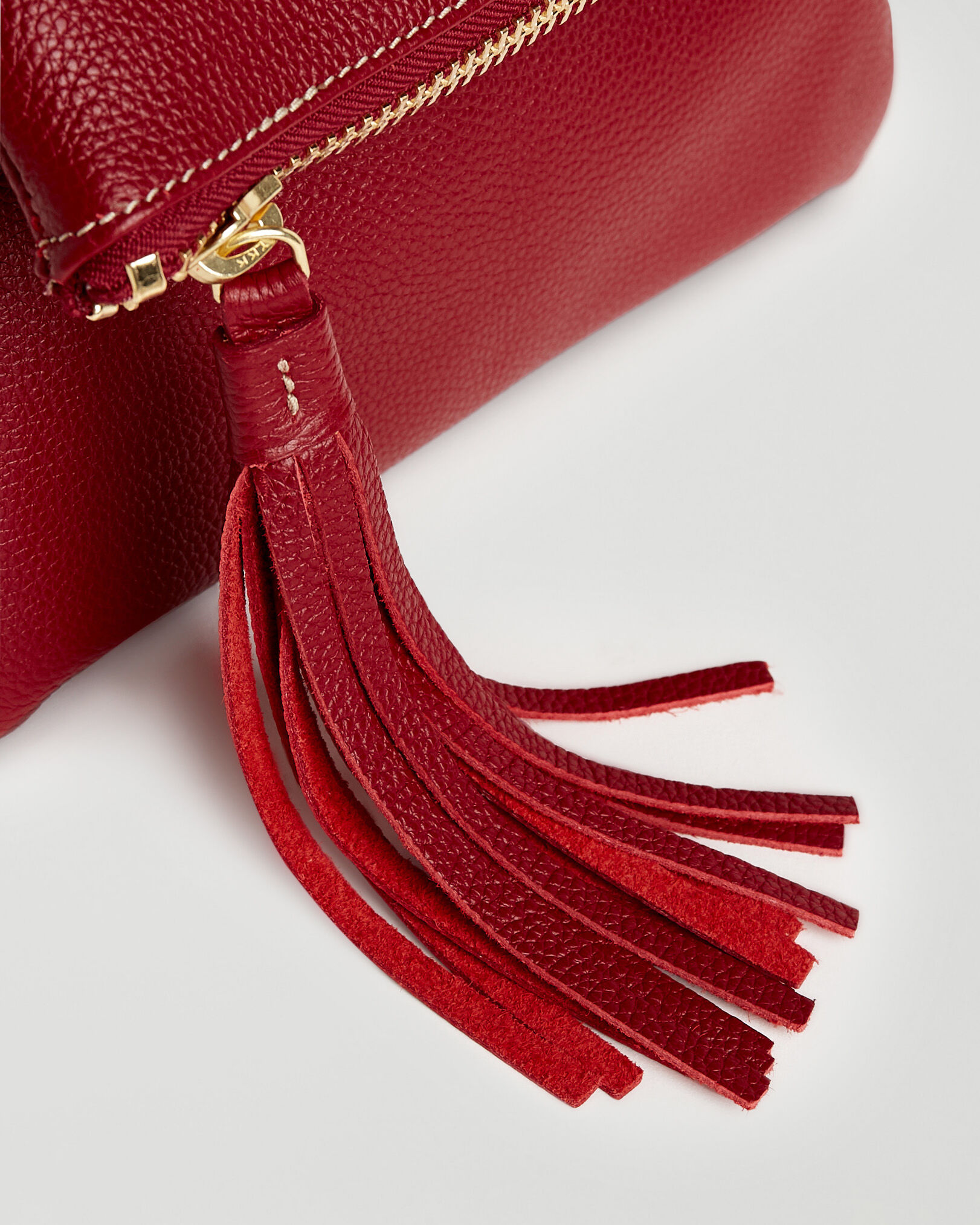 Roots clutch purse sale