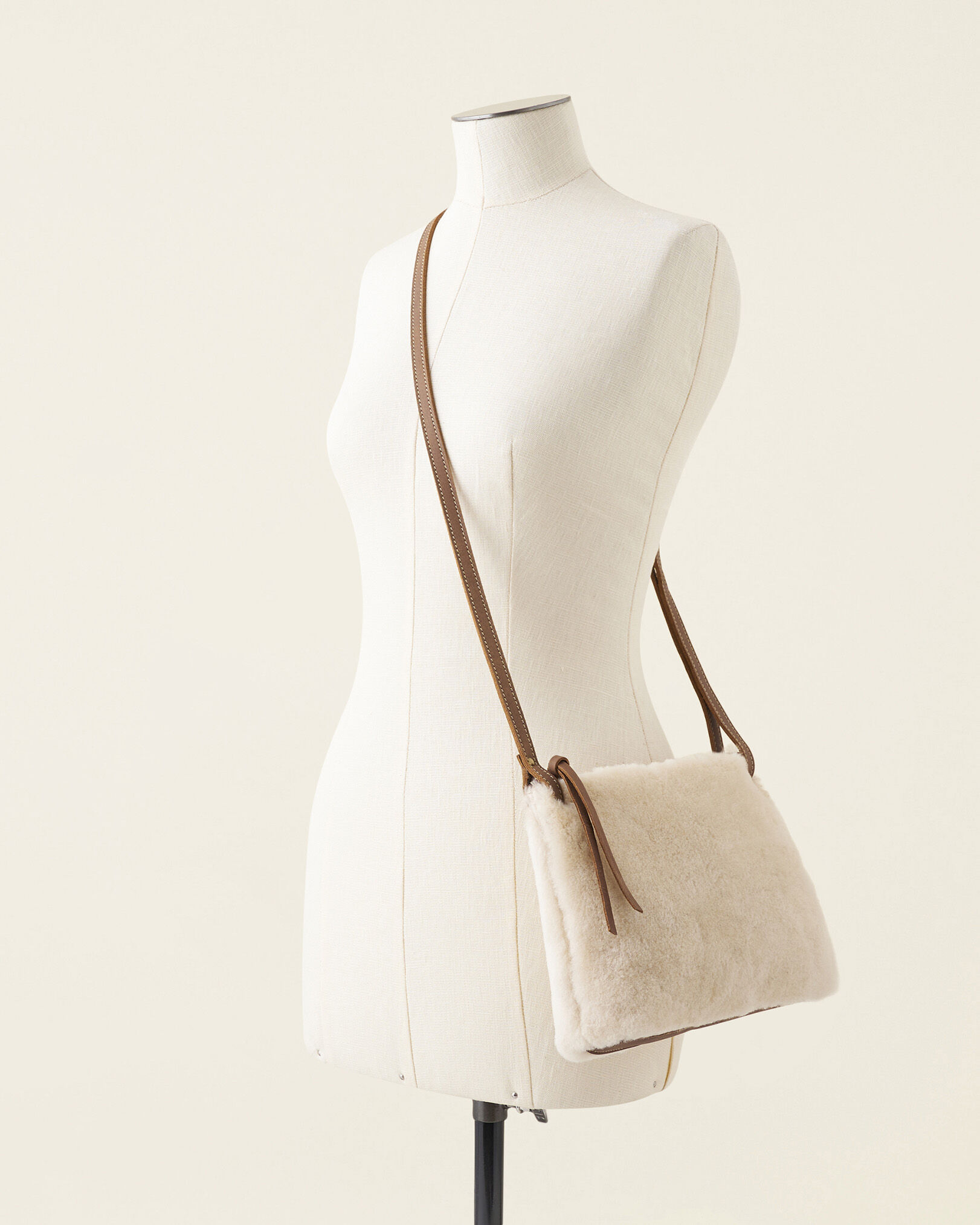 Edie store crossbody bag