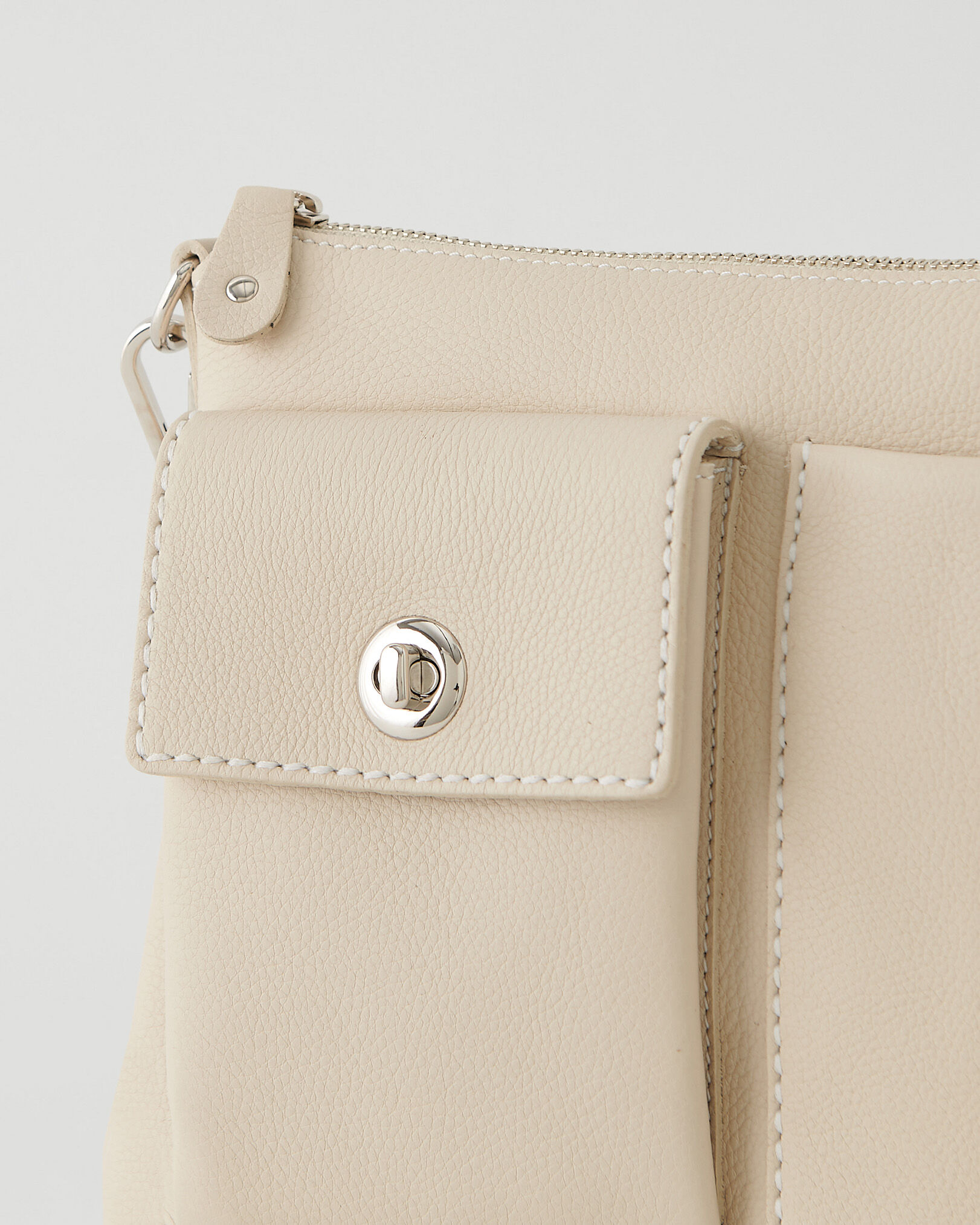 Roots villager bag deals
