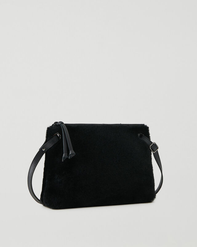 Roots Shearling Edie Bag. 1
