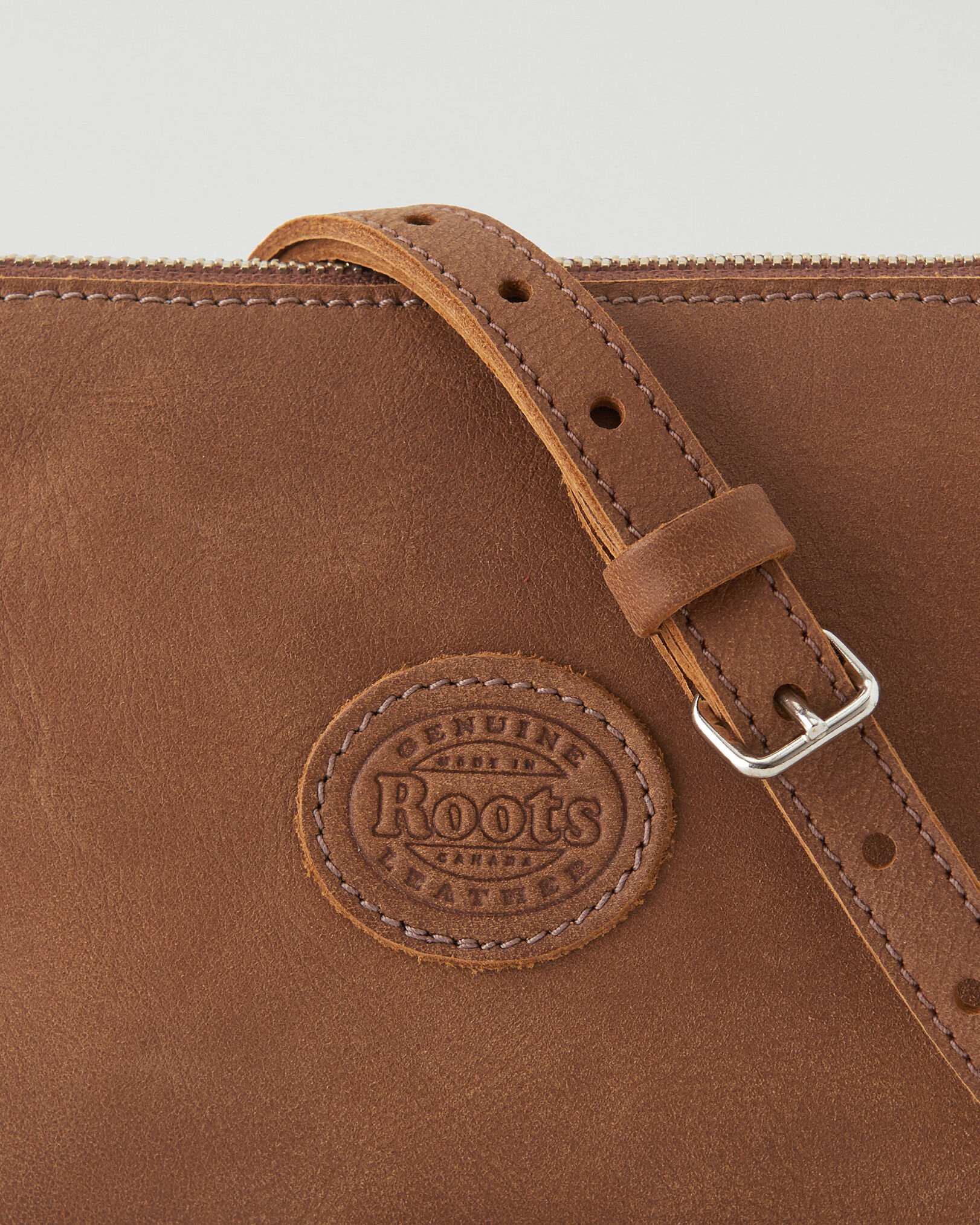 Roots leather purse outlet