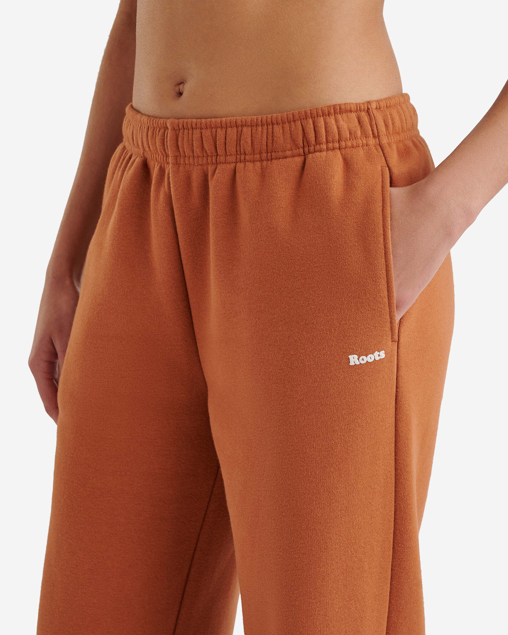Orange roots pants shop