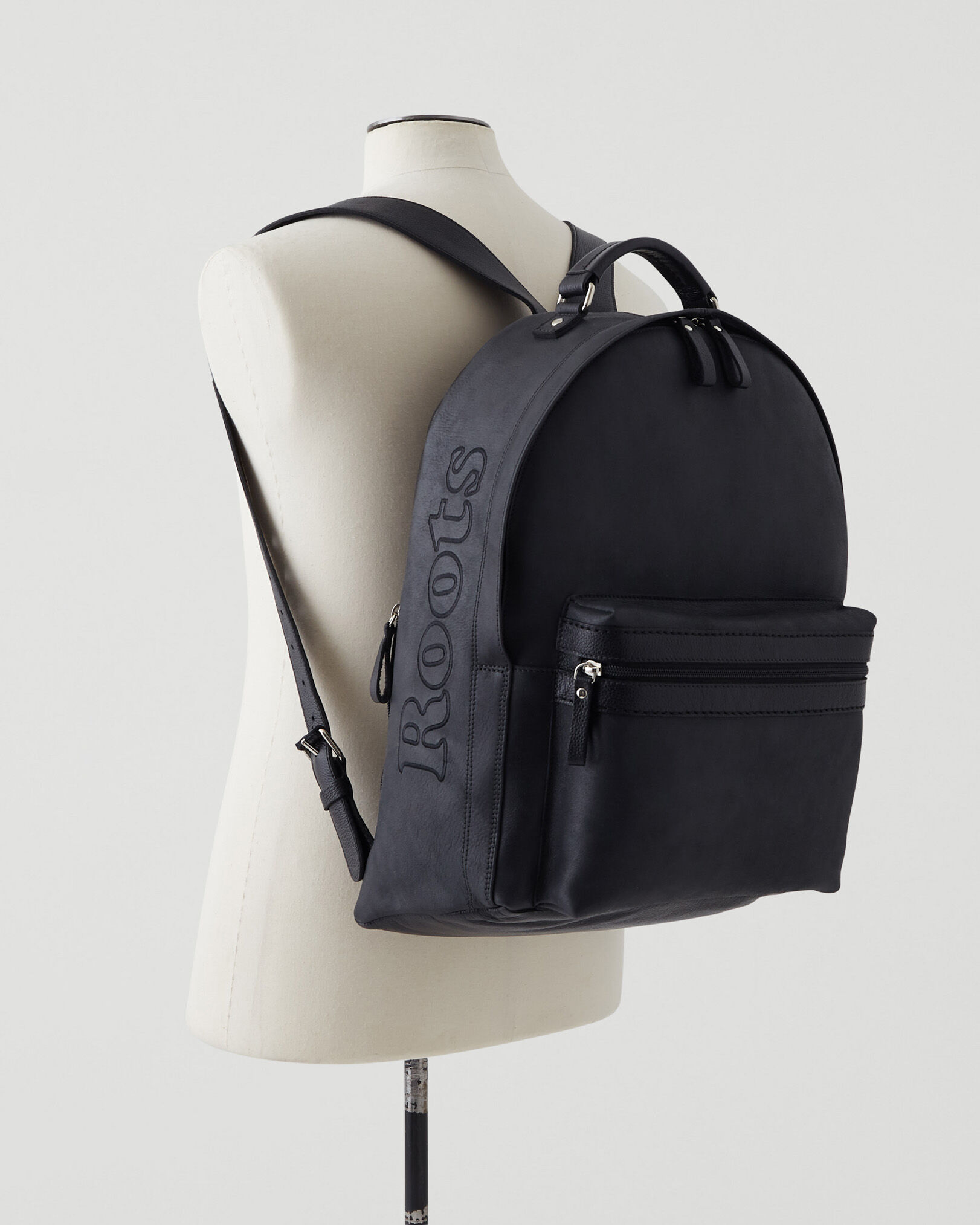 Roots discount backpack purse