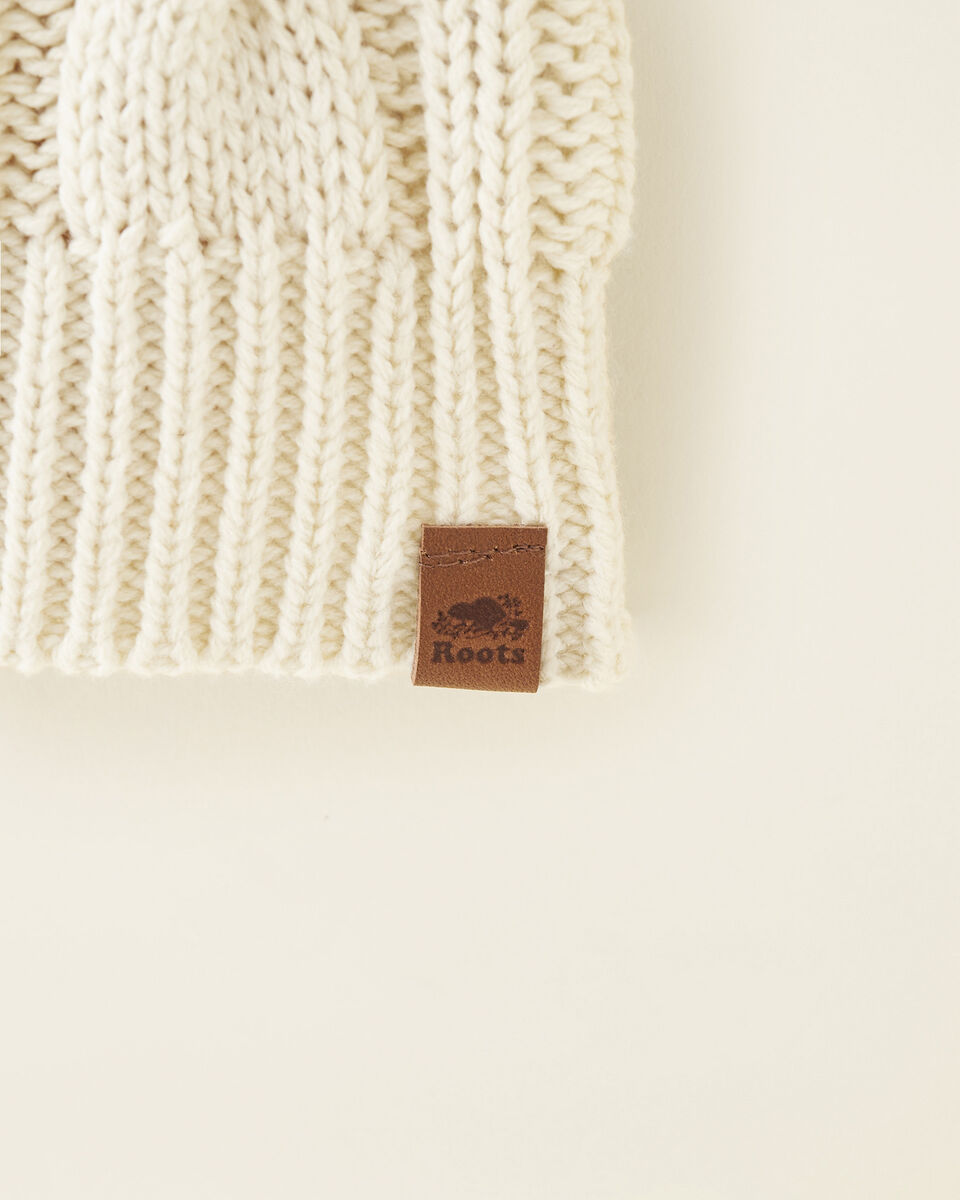 Robe en tricot à col en V et torsades pour toutes-petites