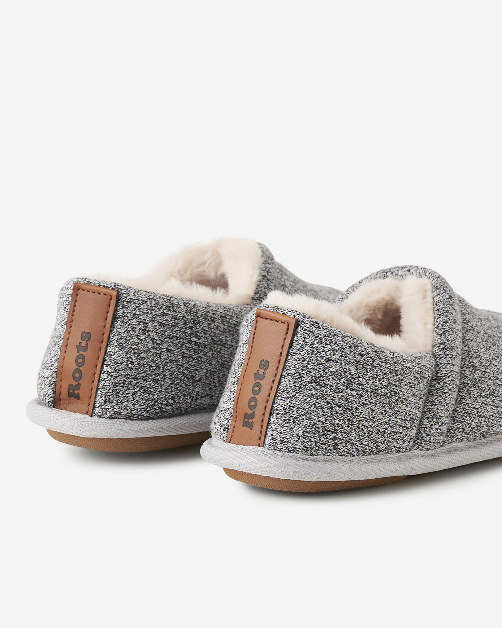 Roots slippers sales