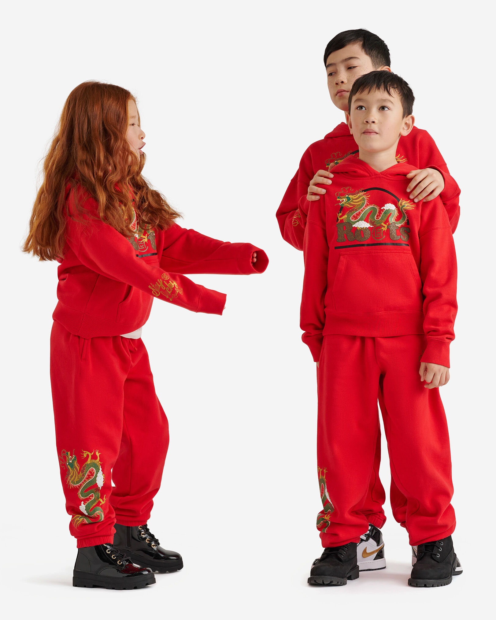 Red hot sale roots tracksuit