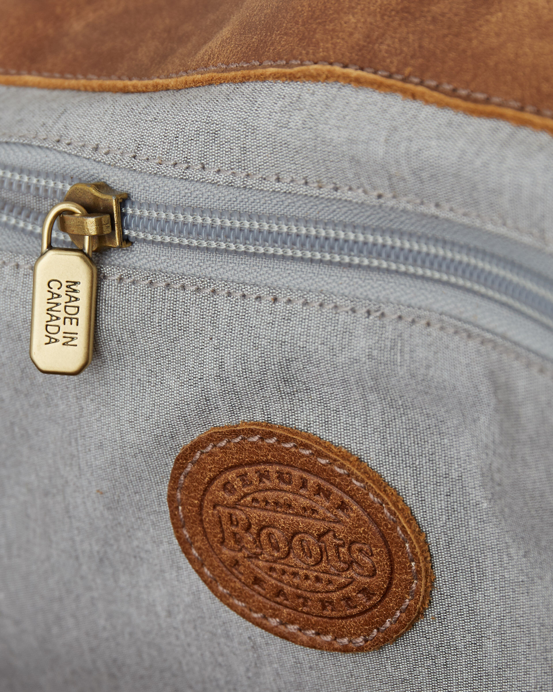 Roots tribe leather best sale bag