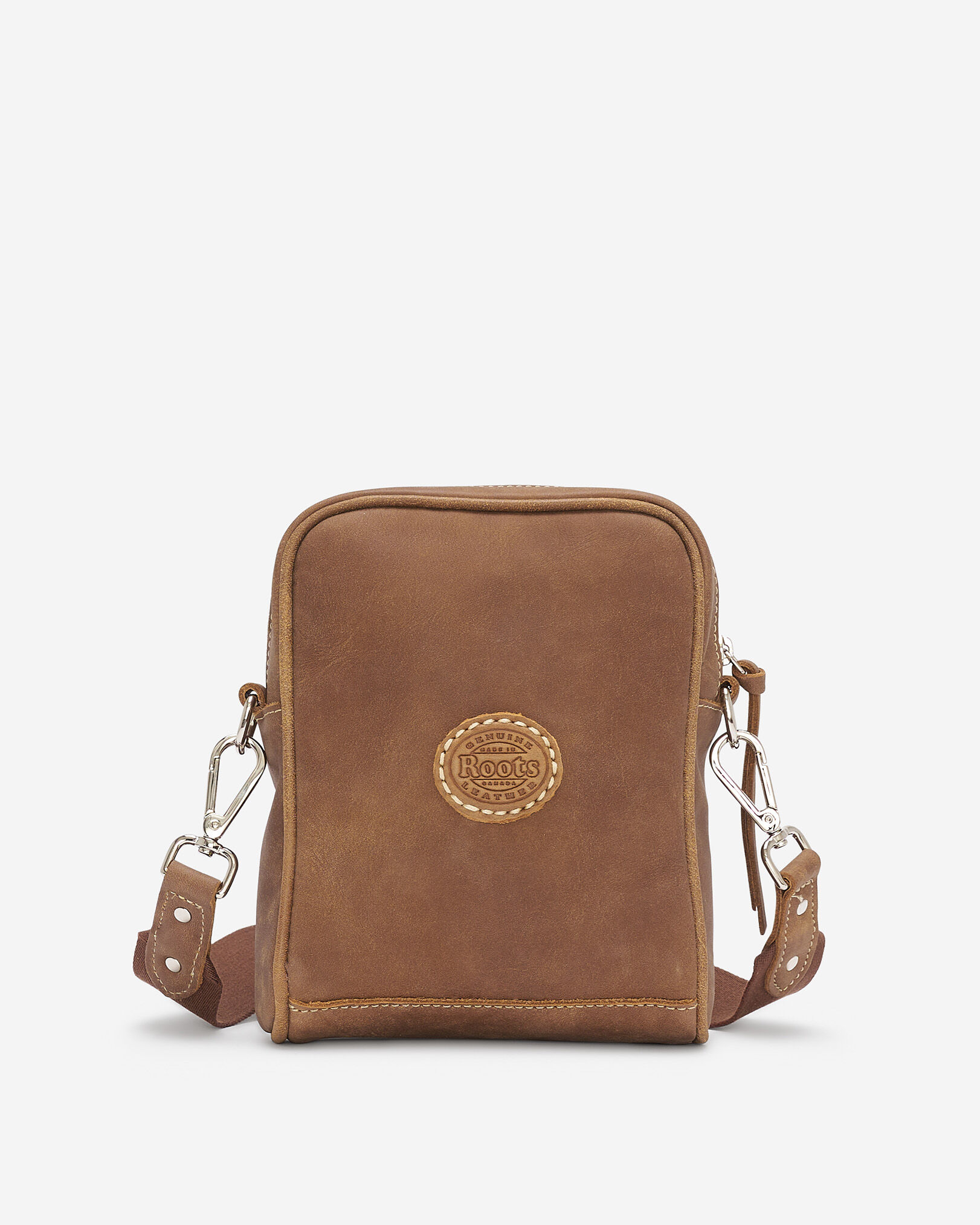 Roots cross body best sale bag
