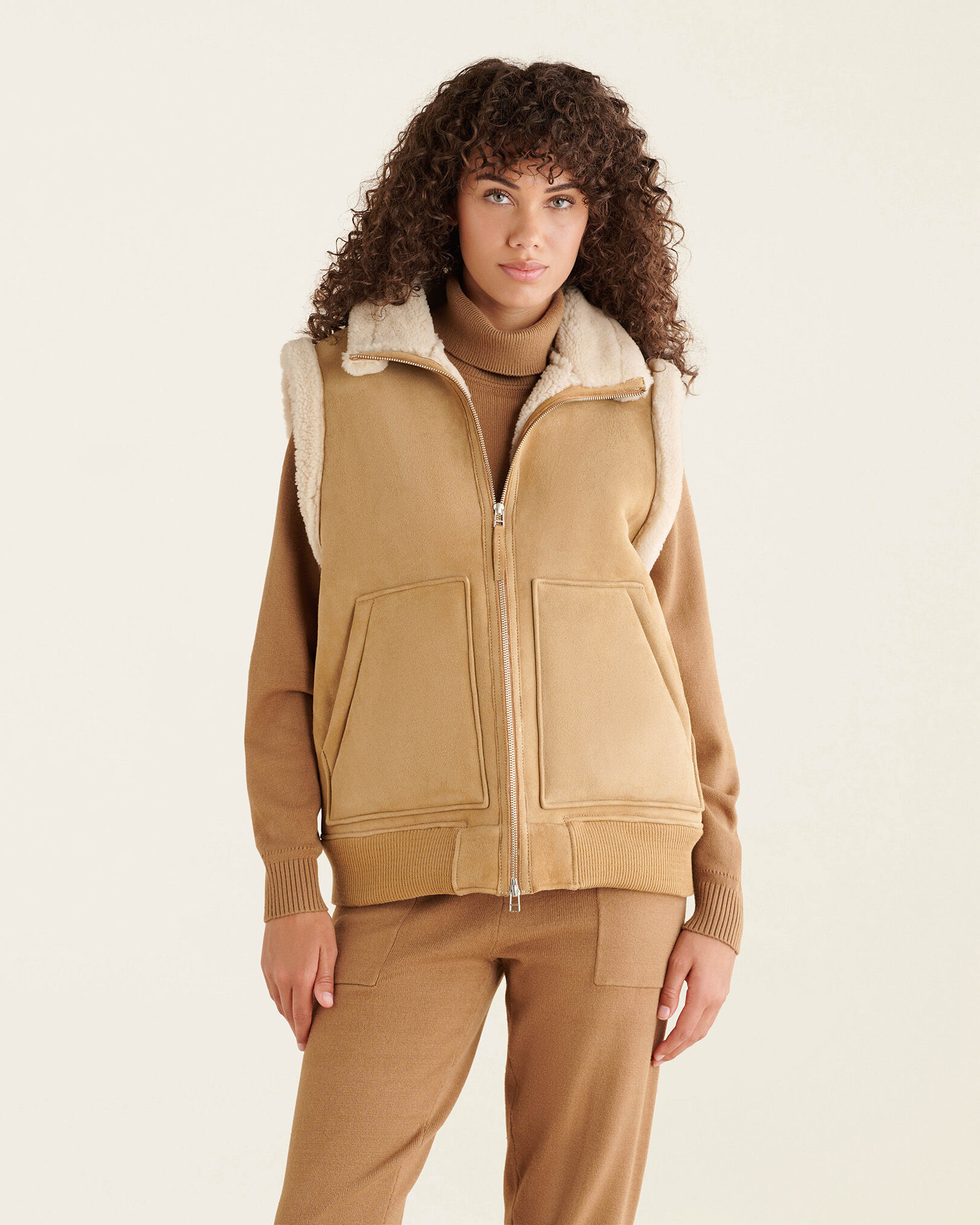Roots puffer vest deals