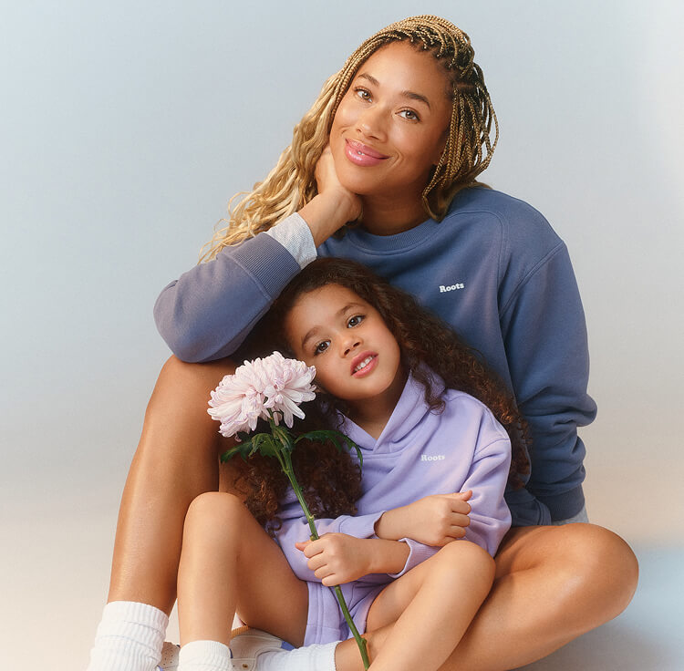 Mother and child wearing Roots apparel