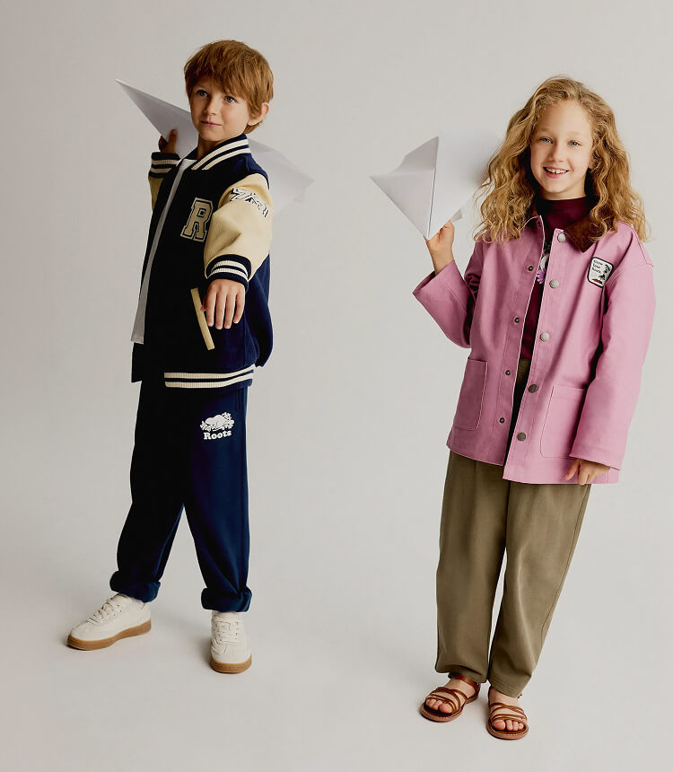 Children wearing Roots clothing from the new back-to-school collection.