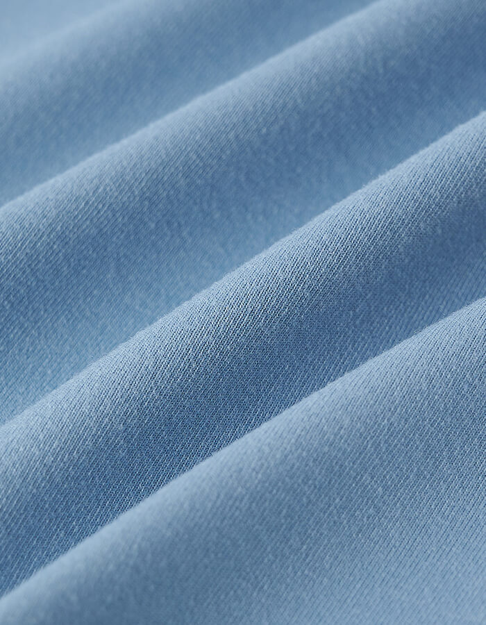 Close-up of soft blue fabric