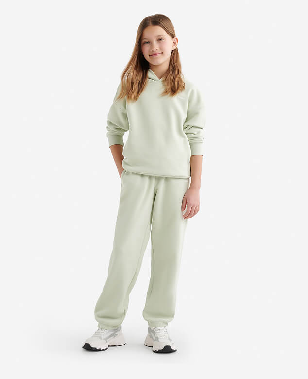 Girl wearing kids Cloud Sweats set.