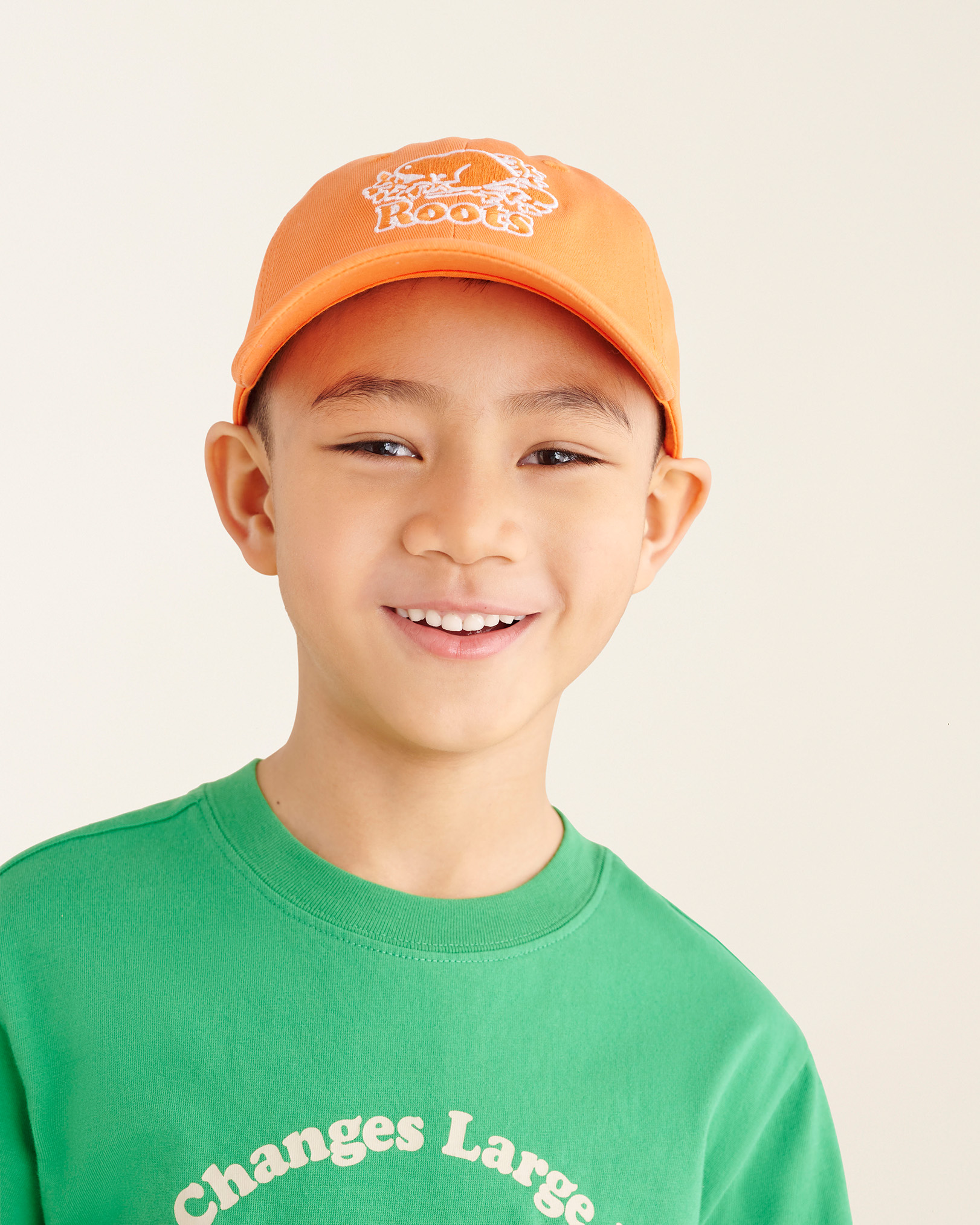 Roots Kids Essential Glow Baseball Cap Hat in Orange