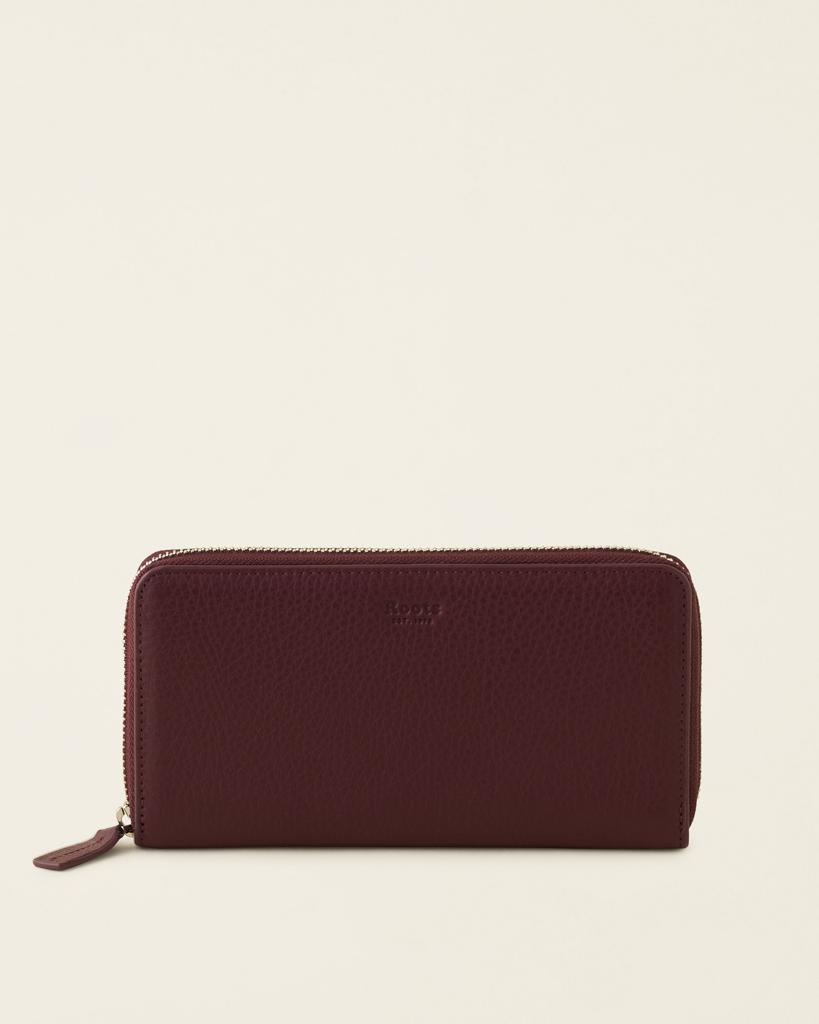 Roots Zip Around Clutch Cloud in Bordeaux