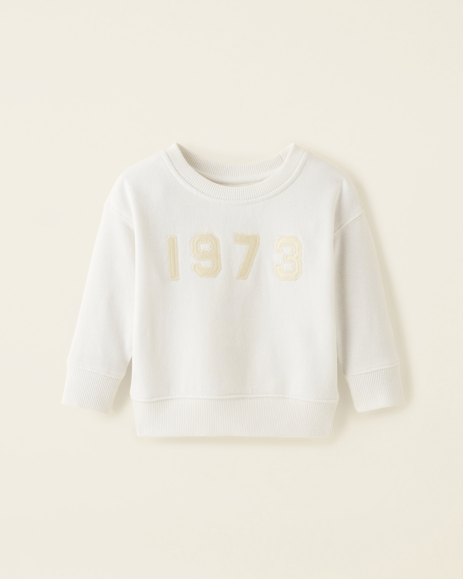 Roots Baby One 1973 Crew Sweatshirt in Coconut Milk